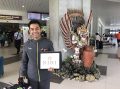 バリ島空港国内線ターミナルで笑顔でお出迎え
